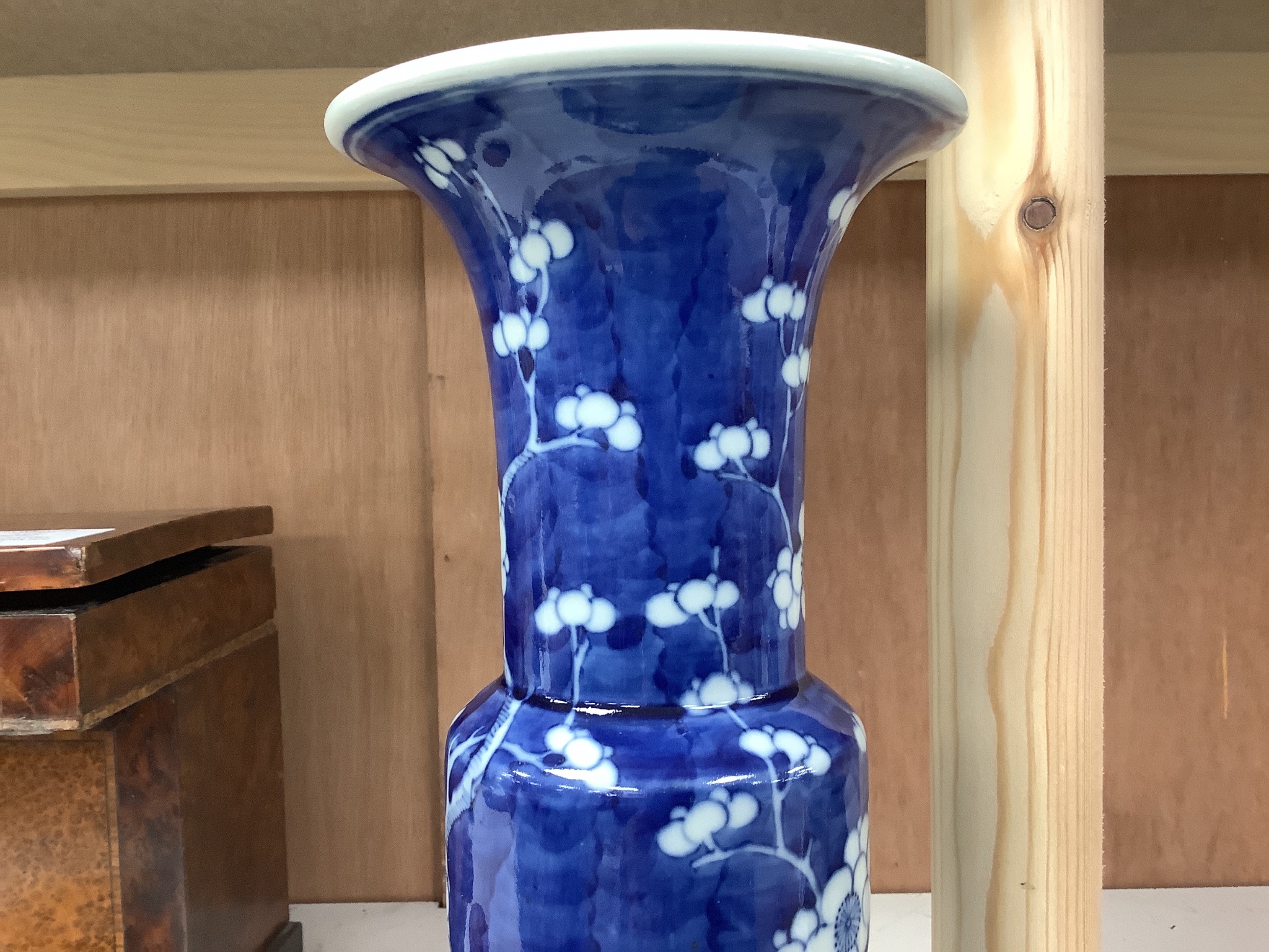 A Chinese blue and white prunus decorated gu vase, 26.5cm